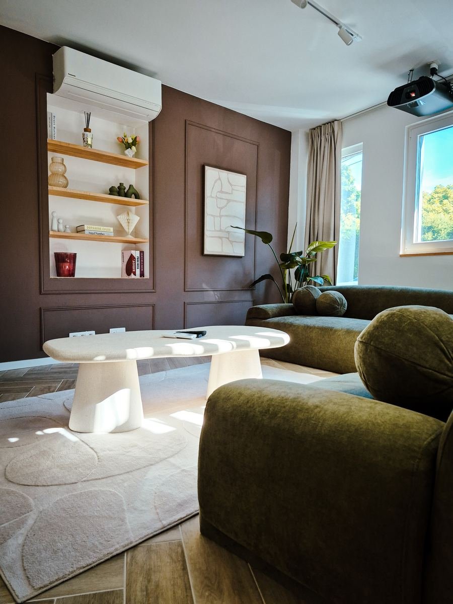 Salon de la suite Maison H, point de départ des escapades à Liège